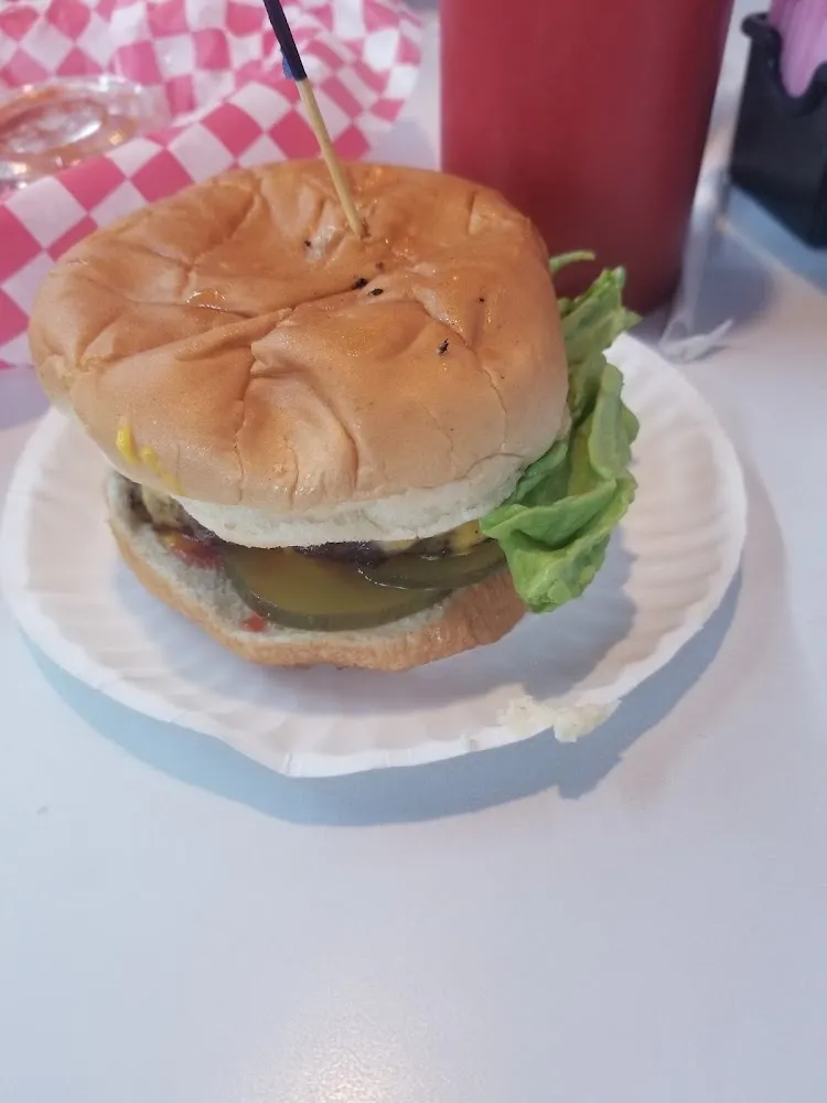 Cheeseburger with Pickles and Lettuce Mustard and Ketchup